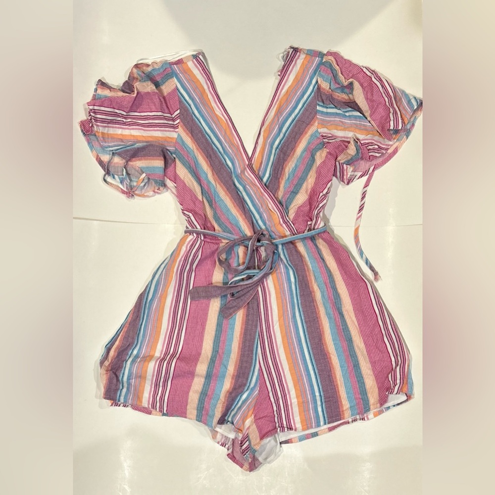 Pastel multi-colored vertical striped romper with ribbon belt and a v-neck style